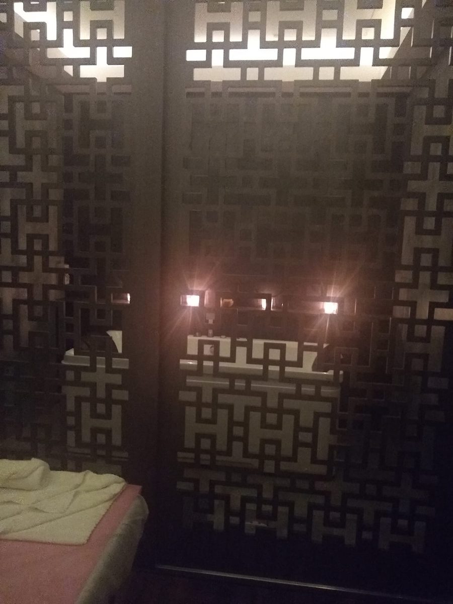 The hydrotherapy room at the Al Garhoud spa centre, with candles and a deep soaking bath